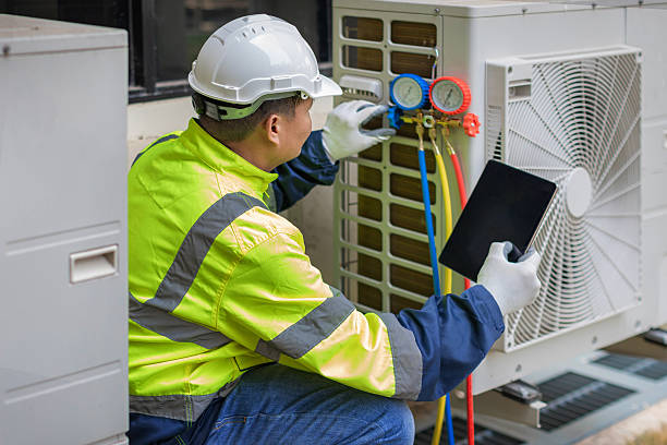 Professional Hvac technician working in Holmesville, OH
